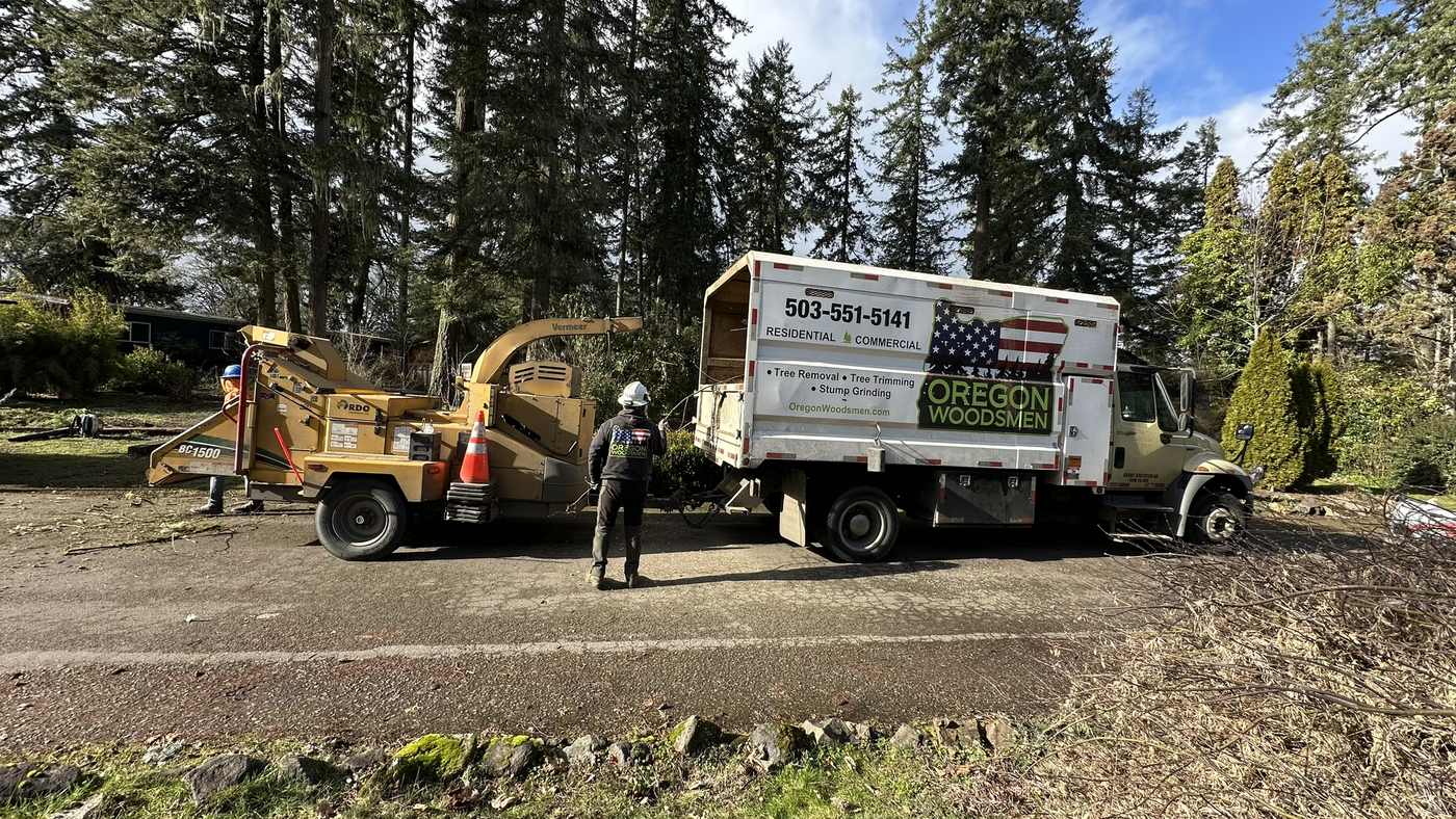 Chipper and chip truck on a job site
