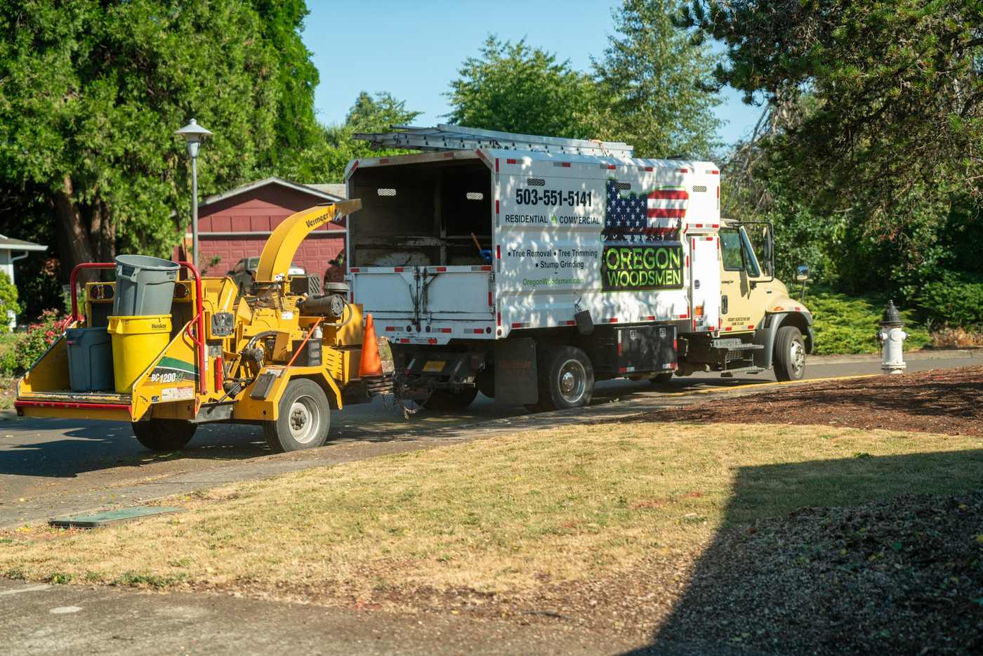 Oregon Woodsmen chip truck and chipper